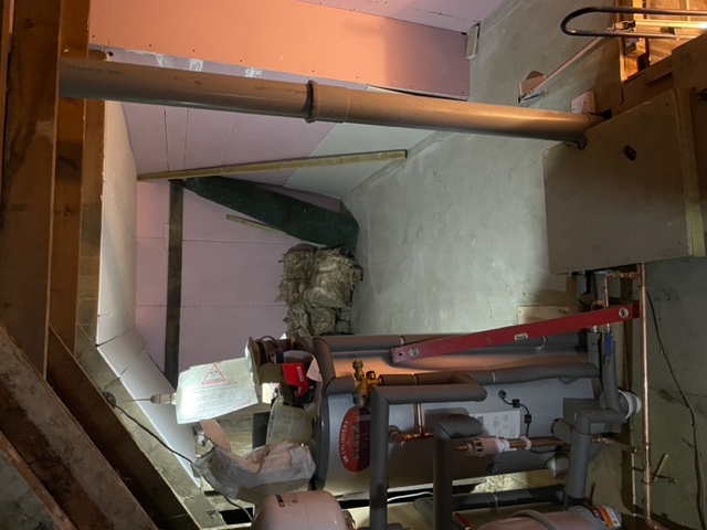 The raised section of the loft ceiling. the joist across the back wall is the old height