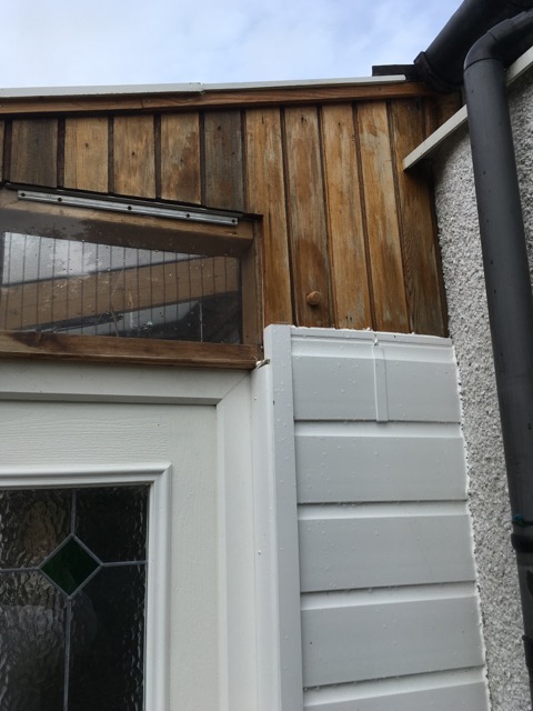 The thermostatic window and the replacement front door, now with a bung in it.